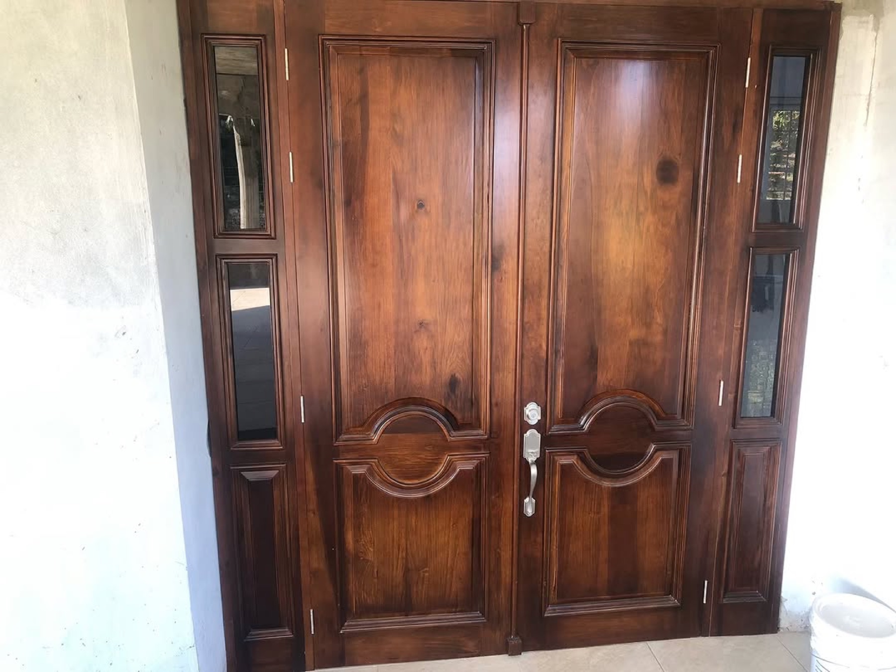 Custom wood front door image from the Exquisite Instagram feed.